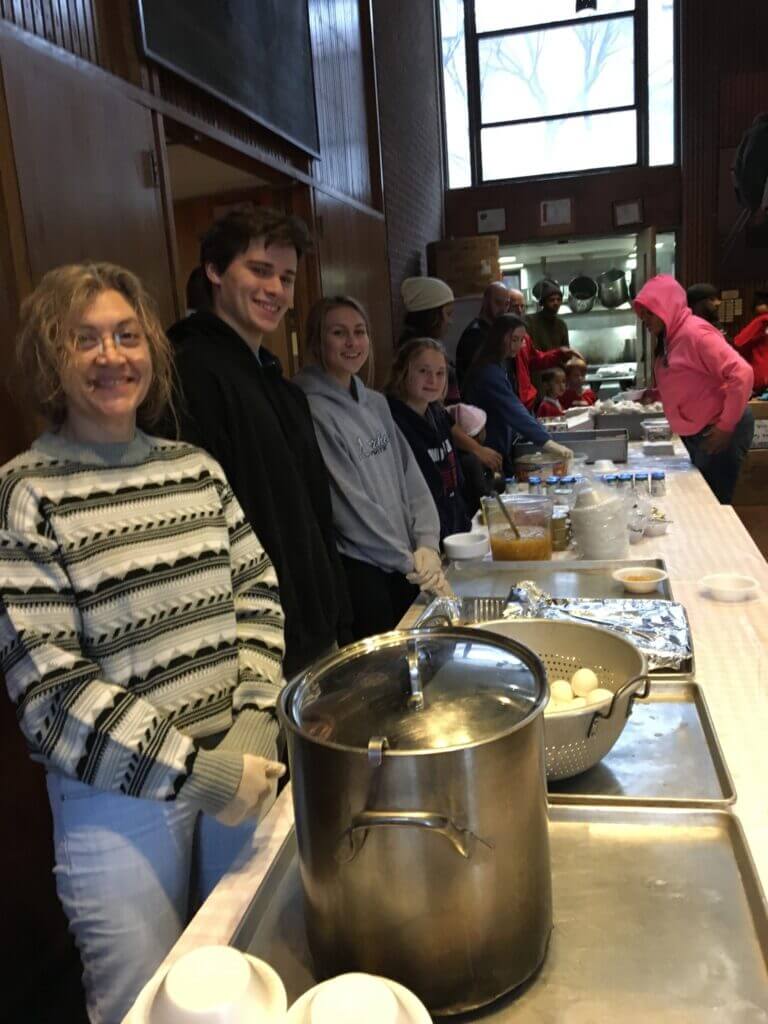 Volunteers ready to serve a meal at Community Soup Kitchen New Haven